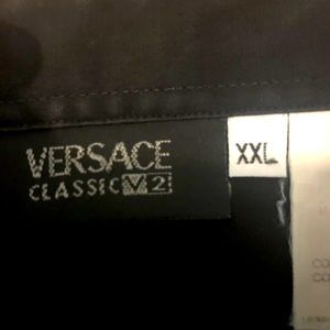 GET READY TO PARTY! VERSACE UNIQUE JET BLACK LONG SLEEVE SHIRT WITH RUFFLES!